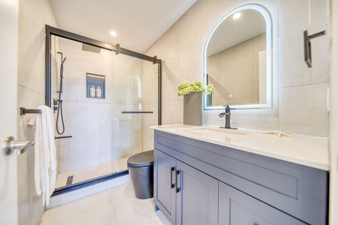 Renovated bathroom with glass shower