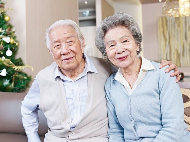 Happy senior couple at home